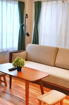 a living room with a couch and a coffee table at ZJ201 Hanama201 The Skytree Residence A Newly Home by Tokyo Iconic Landmarks in Tokyo