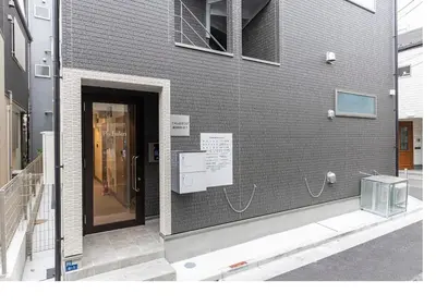 a building with a door on the side of it at \u3077\u3075\u304bTK\u6771\u5411\u5cf62F - 1min to Higashi Mukojima Sta 2F Cozy Stay Near Skytree Asakusa in Tokyo