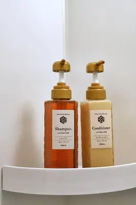 three bottles of soap sitting on a shelf at ZJ202 Hanama202 The Skytree Residence A Newly Home by Tokyo Iconic Landmarks in Tokyo