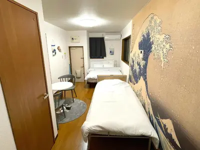a hospital room with two beds and a wall at japanese art kiyo-e house traditional towns self check in in Tokyo