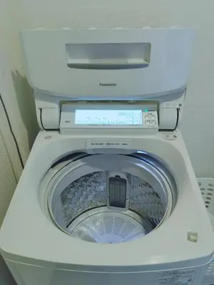 a washing machine with its lid up in a bathroom at #203WZNET\u6885\u5c4b\u6577\u99c52\u5206\u6a2a\u6d5c\u7fbd\u7530\u7a7a\u6e2f\u90fd\u5fc3\u4fbf\u5229\u5546\u5e97\u88571ldk\u5e83\u3044 in Tokyo