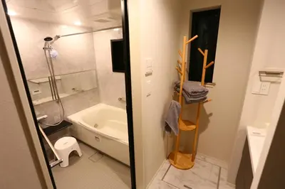 a bathroom with a shower and a toilet and a sink at Metro 4 min to Shinjuku St Luxury Home in Shinjuku City in Tokyo