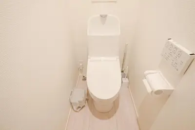 a bathroom with a white toilet in a stall at Mi-Villa SOMO in Tokyo