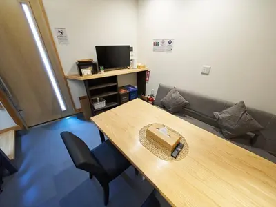 a conference room with a table and a couch at Accommodation Kisakata - Vacation STAY 63868v in Tokyo