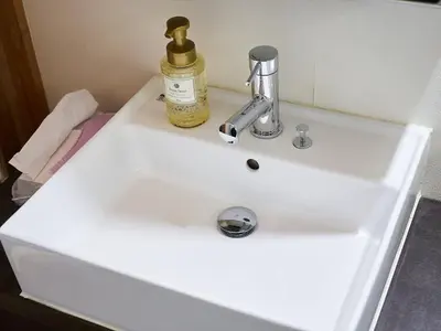 a white sink with a bottle of soap on it at Accommodation Kisakata - Vacation STAY 63868v in Tokyo