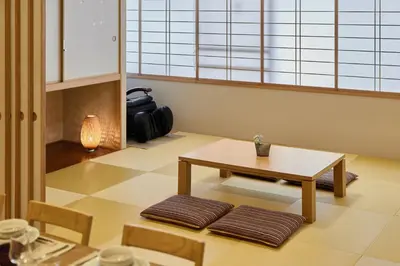 a room with a table and some chairs and a table at KEYAKIAN Tokyo Nihonbashi in Tokyo