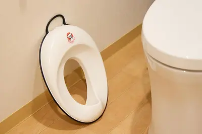 a white toilet seat with a hello kitty sticker on it at KEYAKIAN Tokyo Nihonbashi in Tokyo