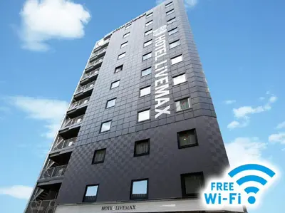 a tall building with the words free wifi on it at HOTEL LiVEMAX Nihonbashi Hakozaki in Tokyo
