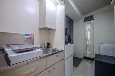 a kitchen with a sink and a counter top at #8 -\u30a2\u30a4\u30e0\u30bf\u30a6\u30f3\u5357\u845b\u897f- Entire Unit in Tokyo
