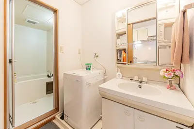 a bathroom with a sink and a toilet and a shower at Happy House NIshi-Koiwa Keisei Koiwa Station 5min in Tokyo