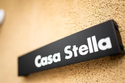 a sign that says casa stilella on a wall at Casa Stella Tokyo #3 Higashi Shinjuku in Tokyo