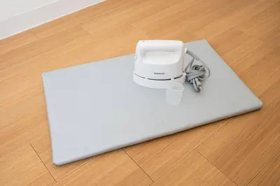 a white device sitting on top of a floor at Casa Stella Tokyo #3 Higashi Shinjuku in Tokyo
