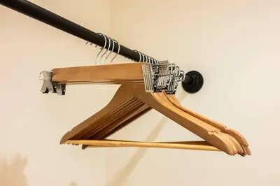 a baseball bat hanging from a wooden rack at Casa Stella Tokyo #3 Higashi Shinjuku in Tokyo