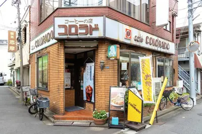 a building on a street with a restaurant at Hotel SHIBA INU in Tokyo
