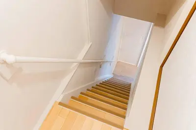 a staircase in a room with a stair railing at Hotel SHIBA INU in Tokyo