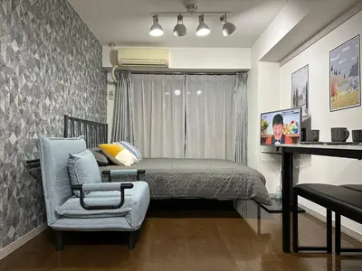 a bedroom with a bed and a chair and a desk at jr\u5c71\u624b\u7ebf \u99d2\u8fbc\u8f66\u7ad93\u5206\u949f \u76f4\u8fbe\u65b0\u5bbf\u6d89\u8c37\u6c60\u888b\u4e0a\u91ce\u79cb\u53f6\u539f Max7 in Tokyo