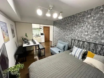a bedroom with a bed and a desk and a chair at jr\u5c71\u624b\u7ebf \u99d2\u8fbc\u8f66\u7ad93\u5206\u949f \u76f4\u8fbe\u65b0\u5bbf\u6d89\u8c37\u6c60\u888b\u4e0a\u91ce\u79cb\u53f6\u539f Max7 in Tokyo