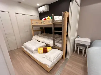 a small room with bunk beds in it at residence MINAMI-AOYAMA102 in Tokyo