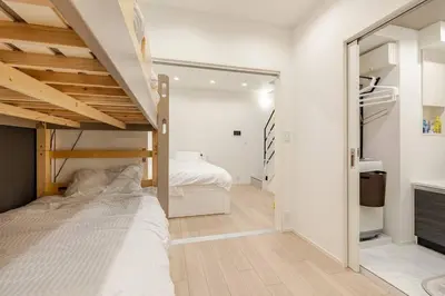 a bedroom with a bed and a bunk room at residence MINAMI-AOYAMA102 in Tokyo