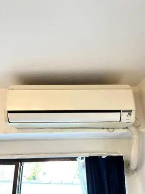 a air conditioner on the top of a ceiling at Nr Ikebukuro! Room size 45m2! Free unlimited Wi-Fi! in Tokyo