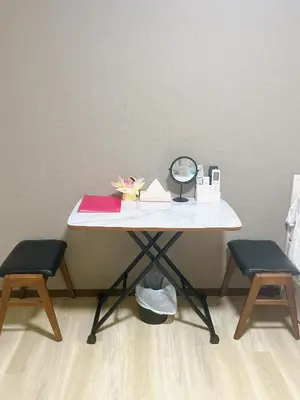 a table with two chairs and a mirror on it at ToyamaHouse2-202 in Tokyo