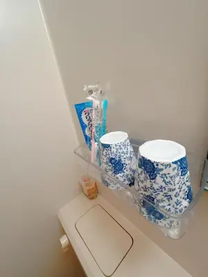 a shelf with two blue and white cups on it at ToyamaHouse2-202 in Tokyo