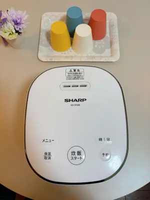 a scale sitting on top of a table at Mori house ookubobiru in Tokyo