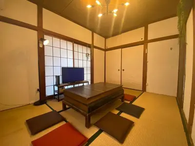 a room with a couch and a tv in it at Push house Urayasu - Vacation STAY 18038 in Tokyo