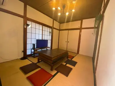 a room with a table and a tv in it at Push house Urayasu - Vacation STAY 18038 in Tokyo