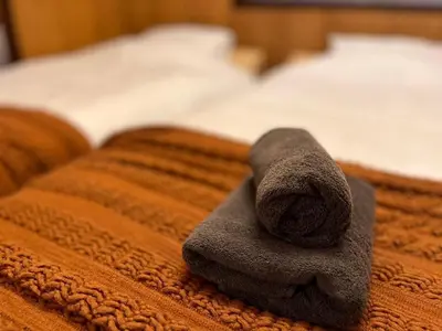 a towel sitting on top of a bed at Push house Urayasu - Vacation STAY 18038 in Tokyo