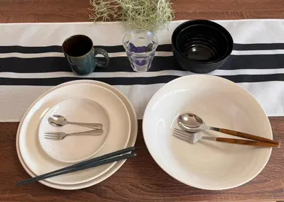 two white plates with forks and spoons on a table at Push house Urayasu - Vacation STAY 18038 in Tokyo