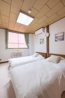 a hospital room with two beds and a window at 2F - Vacation STAY 51571v in Tokyo