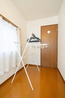a room with a shelf and a wooden door at Tokyo Shinjuku Group Stay-Up to 16 Guests ISJ36 in Tokyo