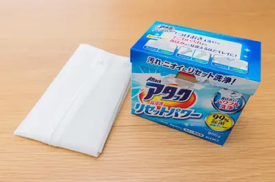 a package of white napkins and a box of milk at Kosumosu in Tokyo