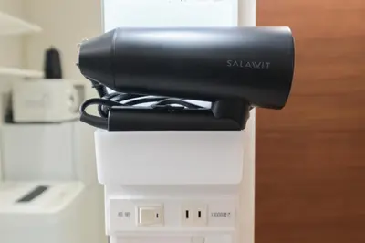 a black object is on top of a samsung machine at GRANQUAL Horikiri by Tranova in Tokyo