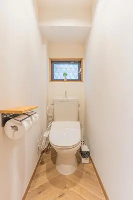 a bathroom with a toilet in a small room at Ken Hotel Tokyo Shinjuku in Tokyo