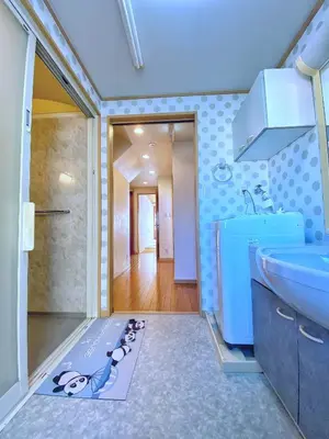 a bathroom with a mickey mouse rug on the floor at \u6c11\u5bbf\u521d\u661f in Tokyo