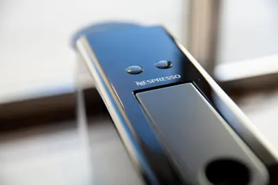 a blue cell phone sitting on a table at NIYS apartments 82type in Tokyo