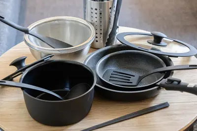 a table with pots and pans and utensils on it at -Asakusa 5chome- 12-minute walk to Asakusa Station! in Tokyo