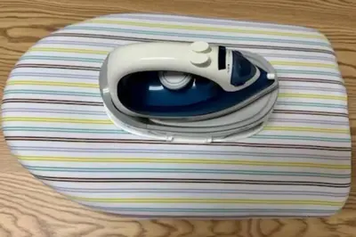 a close up of a phone sitting on a table at \u65b0\u5bbf\u540e\u82b1\u56ed in Tokyo
