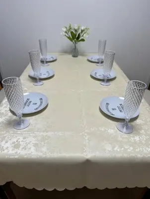 a table with plates and glasses on top of it at \u65b0\u5bbf\u540e\u82b1\u56ed in Tokyo