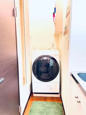 a washer and dryer in a small room at Shinjuku Suginami in Tokyo