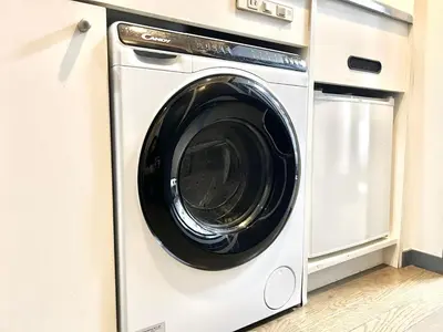 a white washer and dryer in a kitchen at GM35\u65b0\u5bbf\u4e2d\u5fc3 \u8d85\u7ea7\u5546\u5708 \u4ea4\u901a\u67a2\u7ebd \u8f66\u7ad98\u5206\u949f \u6700\u59273\u4eba Shinjuku center 8 mins to ST 3P Maxs \u76f4\u8fbe\u65b0\u5bbf \u6d89\u8c37 \u8868\u53c2\u9053 \u54c1\u5ddd \u6c60\u888b \u4e0a\u91ce \u4ee3\u4ee3\u6728 \u94f6\u5ea7 \u539f\u5bbf in Tokyo