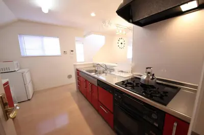 a kitchen with a sink and a stove top oven at Urayasu Detached house UK1 in Tokyo