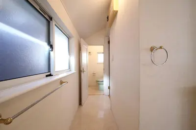 a bathroom with a large window and a tv on the wall at Urayasu Detached house UK1 in Tokyo