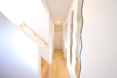 a hallway with white walls and wooden floors at Urayasu Detached house UK1 in Tokyo