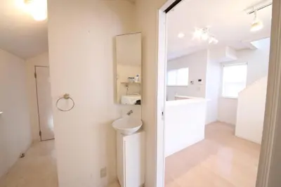 a white bathroom with a sink and a mirror at Urayasu Detached house UK1 in Tokyo