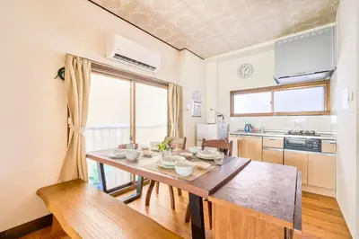a kitchen with a table with bowls on it at Kinshicho detached house KK23 in Tokyo