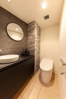 a bathroom with a white toilet and a sink at Premier suite Roppongi Tokyo in Tokyo
