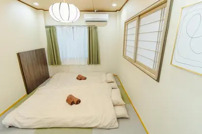 a hospital room with a bed with a dog on it at QiQi House Tokyo Hirai Villa 2Bath3WCs 4min Station 24min to Akihabara in Tokyo